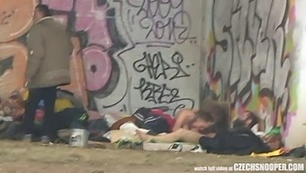 A Homeless Couple Engages In Sexual Activity On A Street While Being Filmed By A Hidden Camera