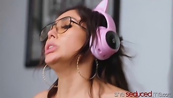 Ember Snow, An Asian Seductress, Entices Another Gamer Girl Named Jena Larose.
